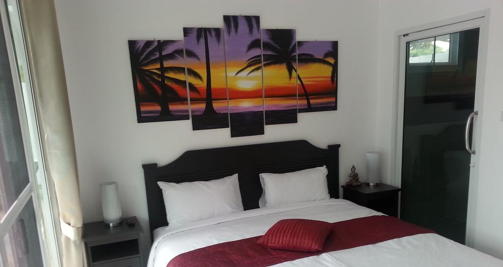 Coconut Palms Hotel Kantharawichai Room photo